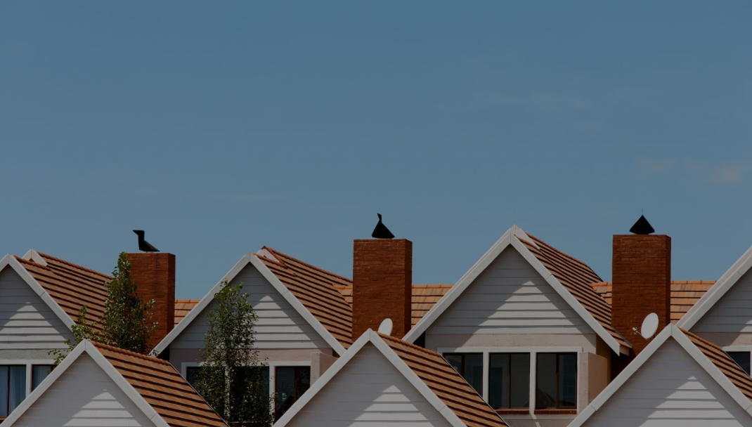Onnit Roofing — rooflines under a Kingman sky